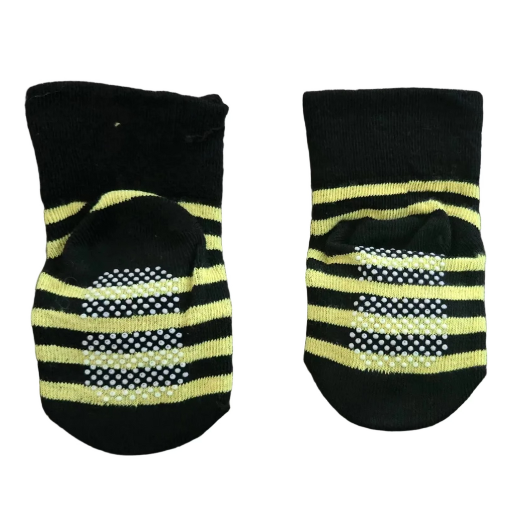 Pair of black socks with yellow stripes 